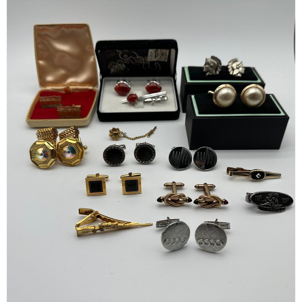 Lot of cufflinks and tie bars